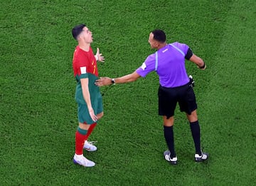 Soccer Football - FIFA World Cup Qatar 2022 - Group H - Portugal v Ghana - Stadium 974, Doha, Qatar - November 24, 2022 Portugal's Cristiano Ronaldo reacts towards referee Ismail Elfath REUTERS/Fabrizio Bensch