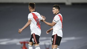 BUENOS AIRES, ARGENTINA - SEPTEMBER 19: Braian Romero and Julian Alvarez of River Plate celebrate their first goal scored by an own goal of Emiliano Mendez of Arsenal (not in Frame) during a match between River Plate and Arsenal as part of Torneo Liga Profesional 2021 at Estadio Monumental Antonio Vespucio Liberti on September 19, 2021 in Buenos Aires, Argentina. (Photo by Marcelo Endelli/Getty Images)
