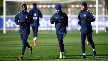 Griezmann, flanqueado por Umtiti y Lucas. Entre el Barcelona y el Atlético.