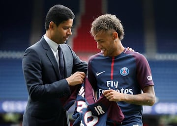 Happier days | New Paris Saint-Germain signing Neymar Jr and club president Nasser Al-Khelaifi pose with the club shirt.