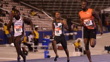 Usain Bolt durante los cuartos de final de los 100 metros en los campeonatos nacionales de Jamaica.