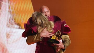 The two finally met during the opening segment of Sunday’s Grammy Awards, with Johnson noting he went to great lengths to keep things under wraps.