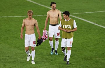 Soccer Football - FIFA Club World Cup - CF Pachuca vs Wydad AC - Zayed Sports City Stadium, Abu Dhabi, United Arab Emirates - December 9, 2017 Pachuca's Keisuke Honda, Raul Lopez and Erick Gutierrez celebrate after the match REUTERS/Ahmed Jadallah