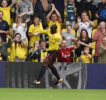 Okaka celebrates Watford first goal of the Premier League campaign.