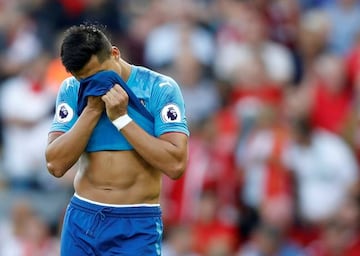 Arsenal's Alexis Sánchez looks dejected after Liverpool's third goal at Anfield on Sunday.