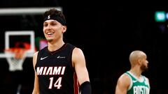 BOSTON, MA - APRIL 24: Tyler Herro #14 of the Miami Heat smiles as Derrick White #9 of the Boston Celtics looks towards his bench during the third quarter of game two of the Eastern Conference First Round Playoffs at TD Garden on April 24, 2024 in Boston, Massachusetts. NOTE TO USER: User expressly acknowledges and agrees that, by downloading and/or using this Photograph, user is consenting to the terms and conditions of the Getty Images License Agreement. (Photo By Winslow Townson/Getty Images) (Photo by Winslow Townson / GETTY IMAGES NORTH AMERICA / Getty Images via AFP)