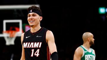 BOSTON, MA - APRIL 24: Tyler Herro #14 of the Miami Heat smiles as Derrick White #9 of the Boston Celtics looks towards his bench during the third quarter of game two of the Eastern Conference First Round Playoffs at TD Garden on April 24, 2024 in Boston, Massachusetts. NOTE TO USER: User expressly acknowledges and agrees that, by downloading and/or using this Photograph, user is consenting to the terms and conditions of the Getty Images License Agreement. (Photo By Winslow Townson/Getty Images) (Photo by Winslow Townson / GETTY IMAGES NORTH AMERICA / Getty Images via AFP)