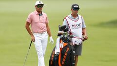 DETROIT, MICHIGAN - JUNE 26: Rickie Fowler of the United States stands with his caddie on the fourth hole during a practice round prior to the Rocket Mortgage Classic at Detroit Golf Club on June 26, 2024 in Detroit, Michigan.   Raj Mehta/Getty Images/AFP (Photo by Raj Mehta / GETTY IMAGES NORTH AMERICA / Getty Images via AFP)