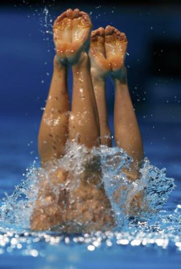 Jung Young-hee y Kong Do-yeon de Corea del Sur, durante los preliminares libres por pareja.