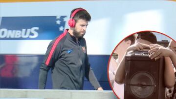 Piqué llegó a Madrid entre pifias, ovación y... ¡el himno del Barça!