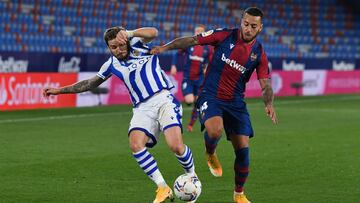 VALENCIA, SPAIN - DECEMBER 19:  Portu of Real Sociedad battles for possession with Ruben Vezo of Levante UD during the La Liga Santander match between Levante UD and Real Sociedad at Ciutat de Valencia Stadium on December 19, 2020 in Valencia, Spain. Spor