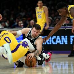 Why were both the Lakers and Mavericks angry at referees after their double overtime game?