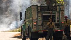 Hundreds of firefighters scrambled Monday to prevent a wildfire engulfing an area of rare giant sequoia trees in California's Yosemite National Park.
