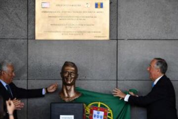 Madeira airport, the birthplace of Portuguese footballer Cristiano Ronaldo, was renamed today in honor of the quadruple Ballon d'or and captain of the Portuguese team sacred European champion last summer. / AFP PHOTO / FRANCISCO LEONG