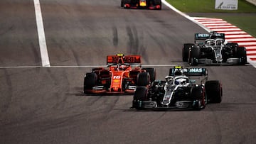 (From L) Ferrari's Monegasque driver Charles Leclerc, Mercedes' Finnish driver Valtteri Bottas and Mercedes' British driver Lewis Hamilton steer their cars during the Formula One Bahrain Grand Prix at the Sakhir circuit in the desert south of the Bahraini capital Manama, on March 31, 2019. (Photo by Andrej ISAKOVIC / AFP)