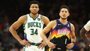 Feb 10, 2022; Phoenix, Arizona, USA; Phoenix Suns guard Devin Booker (1) alongside Milwaukee Bucks forward Giannis Antetokounmpo (34) in the first half at Footprint Center. Mandatory Credit: Mark J. Rebilas-USA TODAY Sports