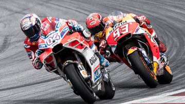 CBR217. Spielberg (Austria), 13/08/2017.- Italian MotoGP rider Andrea Dovizioso (L) of the Ducati Team in action in front of Spaniard Marc Marquez of Repsol Honda Team in the Motorcycling Grand Prix of Austria at the Spielberg Ring in Spielberg, Austria, 13 August 2017. (Motociclismo, Ciclismo) EFE/EPA/CHRISTIAN BRUNA