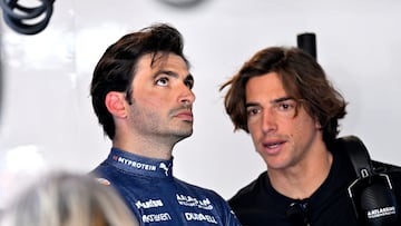 Carlos Sainz, junto a Roberto Merhi en el GP de Canadá de F1.