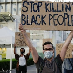 Who is George Floyd and why was he arrested by Minneapolis police?