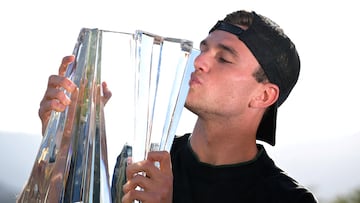 Mar 16, 2025; Indian Wells, CA, USA; Jack Draper (GBR) holds the championship trophy after defeating Holger Rune (not pictured) in the final of the BNP Paribas Open at the Indian Well Tennis Garden. Mandatory Credit: Jayne Kamin-Oncea-Imagn Images TPX IMAGES OF THE DAY