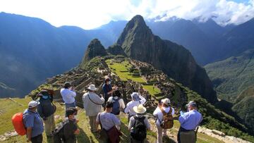 (FILES) In this file photo taken on June 12, 2020, members of a commission of authorities and experts led by the the Governor of Cusco, Jean Paul Benavente, visit the Inca citadel of Machu Picchu, assessing the new health and distancing protocols in order to reopen to the public. - Closed since March 16, 2020 due to the COVID-19 coronavirus pandemic, the Inca citadel of Machu Picchu, a jewel of Peruvian tourism, celebrates on July 24, 2020 without visitors the 109th anniversary of its discovery by the American explorer Hiram Bingham. (Photo by Percy Hurtado / AFP)