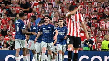 Arsenal's players celebrate their second goal during the UEFA Champions League first round day 1 football match between Athletic Club Bilbao and Arsenal at the San Mames stadium in Bilbao on September 16, 2025. (Photo by ANDER GILLENEA / AFP)