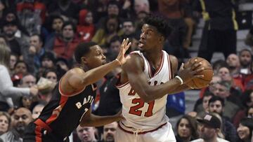 Jan 7, 2017; Chicago, IL, USA; Chicago Bulls forward Jimmy Butler (21) defended by Toronto Raptors guard Kyle Lowry (7) during the first quarter at  the United Center. Mandatory Credit: David Banks-USA TODAY Sports