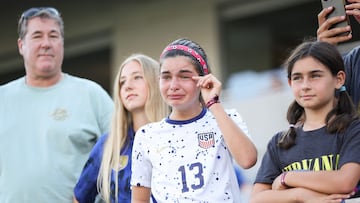 SAN DIEGO, CALIFORNIA - SEPTEMBER 08: An emotional fan of Alex Morgan #13 of San Diego Wave FC looks on before the game against North Carolina Courage at Snapdragon Stadium on September 08, 2024 in San Diego, California. Meg Oliphant/Getty Images/AFP (Photo by Meg Oliphant / GETTY IMAGES NORTH AMERICA / Getty Images via AFP)