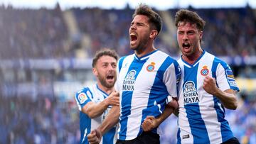 BARCELONA, SPAIN - MARCH 05: Leandro Cabrera (C) of RCD Espanyol celebrates with his teammates Keidi Bare (L) and Javier Puado (R) after scoring the opening goal during the LaLiga Santander match between RCD Espanyol and Getafe CF at RCDE Stadium on March