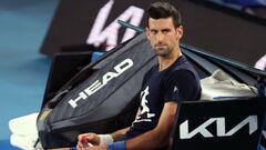 Novak Djokovic of Serbia attends a practice session ahead of the Australian Open tennis tournament in Melbourne on January 14, 2022. (Photo by MARTIN KEEP / AFP) / --IMAGE RESTRICTED TO EDITORIAL USE - NO COMMERCIAL USE--