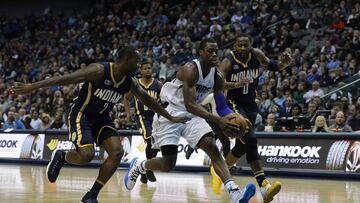 DALLAS, TX - DECEMBER 09: Harrison Barnes #40 of the Dallas Mavericks dribbles the ball against Rodney Stuckey #2 and C.J. Miles #0 of the Indiana Pacers in the second half at American Airlines Center on December 9, 2016 in Dallas, Texas. NOTE TO USER: User expressly acknowledges and agrees that , by downloading and or using this photograph, User is consenting to the terms and conditions of the Getty Images License Agreement.   Ronald Martinez/Getty Images/AFP
 == FOR NEWSPAPERS, INTERNET, TELCOS &amp; TELEVISION USE ONLY ==