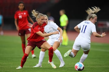 Ana-Maria Crnogorcevic of Switzerland is challenged by Lauren Hemp of England during the Women's International friendly match between Switzerland and England at Stadion Letzigrund on 30 June 30 2022