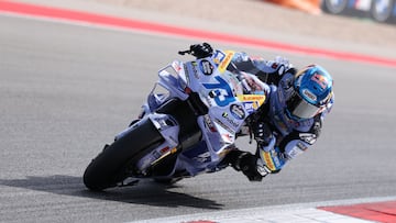 BK8 Gresini Racing MotoGP team's Spanish MotoGP rider Alex Marquez competes during the MotoGP race of the Portuguese Grand Prix at the Algarve International Circuit in Portimao on November 9, 2025. (Photo by PATRICIA DE MELO MOREIRA / AFP)