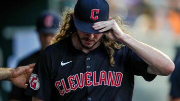 DETROIT, MICHIGAN - JULY 08: Scott Barlow #58 of the Cleveland Guardians looks down after returning to the dugout after a pitching change after allowing Jake Rogers #34 of the Detroit Tigers to score a run the bottom of the eighth inning at Comerica Park on July 08, 2024 in Detroit, Michigan.   Nic Antaya/Getty Images/AFP (Photo by Nic Antaya / GETTY IMAGES NORTH AMERICA / Getty Images via AFP)