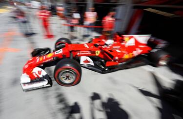 Sebastian Vettel on pole as Ferrari lock down front row
