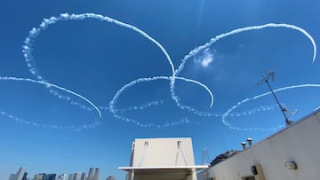 Japan&#039;s Air Self Defense Force (JASDF) aerobatics team, the Blue Impulse, skywrite Olympic rings in a practice run ahead of the official opening of the Tokyo 2020 Olympic Games in Japan.