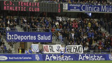 PANCARTA NO AL RACISMO GRADA