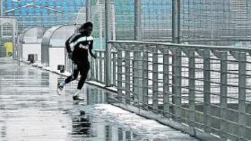 Drenthe y Guti, en el instante de llegar al entrenamiento.