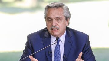 Handout photo released by Argentina's Presidency of President Alberto Fernandez speaking at the Olivos Presidential residence in Olivos, Buenos Aires on August 14, 2020 amid the COVID-19 coronavirus pandemic. - Argentina will extend its social isolation until August 30, with some flexibility in Buenos Aires and more rigor in provinces where the coronavirus has spread, President Alberto Fernandez announced Friday, satisfied with the "horizon" of manufacturing a vaccine. (Photo by ESTEBAN COLLAZO / Argentina's Presidency Press Office / AFP) / RESTRICTED TO EDITORIAL USE - MANDATORY CREDIT "AFP PHOTO / ARGENTINA'S PRESIDENCY / Esteban COLLAZO" - NO MARKETING - NO ADVERTISING CAMPAIGNS - DISTRIBUTED AS A SERVICE TO CLIENTS