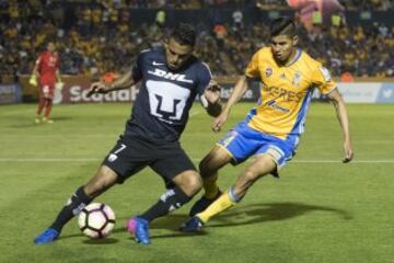 La definición de los cuartos de final en la Concacaf Liga de Campeones se está llevando a cabo estos días. Pachuca es el primer calificado a semifinales al derrotar ayer al Saprissa por 4-0. Entre Pumas y Tigres saldrá el otro mexicano de la fase, juego que se desarrollará esta noche, al igual que el Árabe Unido de Panamá contra el Dallas de la MLS. Mañana, WhiteCaps y New York Red Bulls, ambos de la MLS, definirán al último semifinalista. La ida de las Semis se desarrollará entre el 14 y 15 de marzo. 