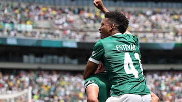 Palmeiras' Brazilian forward #10 Paulinho (bottom) celebrates after scoring the opening goal with teammate Brazilian forward #41 Estevao Willian during the FIFA Club World Cup 2025 round of 16 all-Brazilian football match between Palmeiras and Botafogo at Lincoln Financial Field Stadium in Philadelphia on June 28, 2025. (Photo by FRANCK FIFE / AFP)