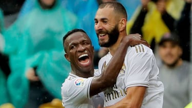 FILE PHOTO: Soccer Football - La Liga Santander - Real Madrid v Levante - Santiago Bernabeu, Madrid, Spain - September 14, 2019 Real Madrid's Karim Benzema celebrates scoring their second goal with Vinicius Junior REUTERS/Susana Vera/File Photo