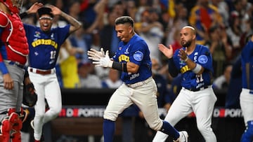 Venezuela's infielder #77 Wilfredo Jose Tovar runs to home base during the Caribbean Series baseball championship game between the Dominican Republic and Venezuela at LoanDepot Park in Miami, Florida, on February 9, 2024. (Photo by Chandan Khanna / AFP)