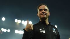 English musician Robbie Williams celebrates after winning a England V Soccer Aid World XI charity football match for Soccer Aid for Unicef at Old Trafford in Manchester, northwest England on June 10, 2018.