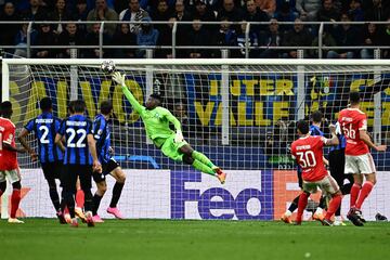 Antonio Silva scores a header past Inter Milan goalkeeper Andre Onana.