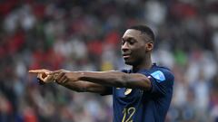 (FILES) In this file photo taken on December 14, 2022 France's forward #12 Randal Kolo Muani celebrates scoring his team's second goal during the Qatar 2022 World Cup semi-final football match between France and Morocco at the Al-Bayt Stadium in Al Khor, north of Doha. (Photo by FRANCK FIFE / AFP)