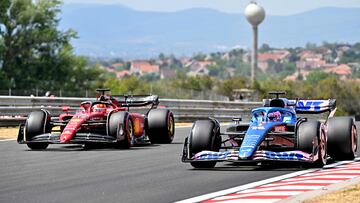 Charles Leclerc (Ferrari F1-75= y Fernando Alonso (Alpine A522). Hungaroring, Hungr¨ªa. F1 2022.