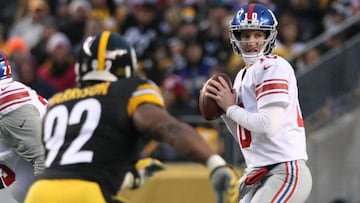 Dec 4, 2016; Pittsburgh, PA, USA; New York Giants quarterback Eli Manning (10) looks to pass against the Pittsburgh Steelers during the first quarter at Heinz Field. Mandatory Credit: Jason Bridge-USA TODAY Sports