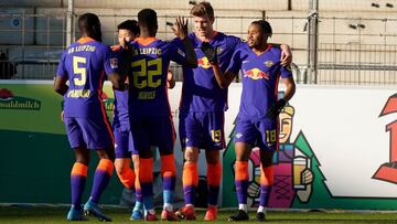 Freiburg Im Breisgau (Germany), 06/03/2021.- Alexander Sorloth of RB Leipzig celebrates with teammates Dayot Upamecano, Nordi Mukiele, and Christopher Nkunku after scoring his team's second goal during the Bundesliga match between Sport-Club Freiburg