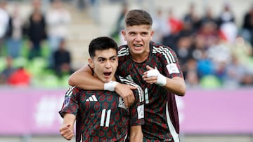 Mexico's midfielder #11 Gilberto Mora celebrates scoring his team's first goal during the 2025 FIFA U-20 World Cup football match between Mexico and Morocco at the Elias Figueroa Stadium in Valparaiso, Chile on October 4, 2025. (Photo by Raul BRAVO / AFP)